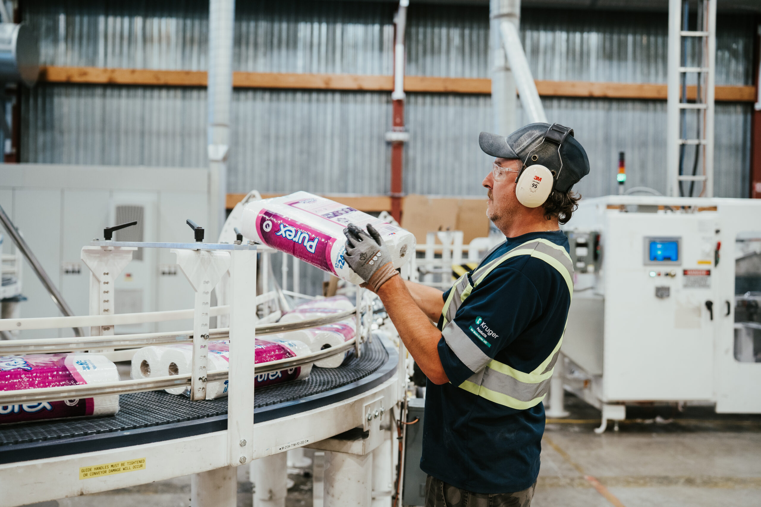 creativebyamy-krugerproducts-employees-7400082 Employee checking product on line