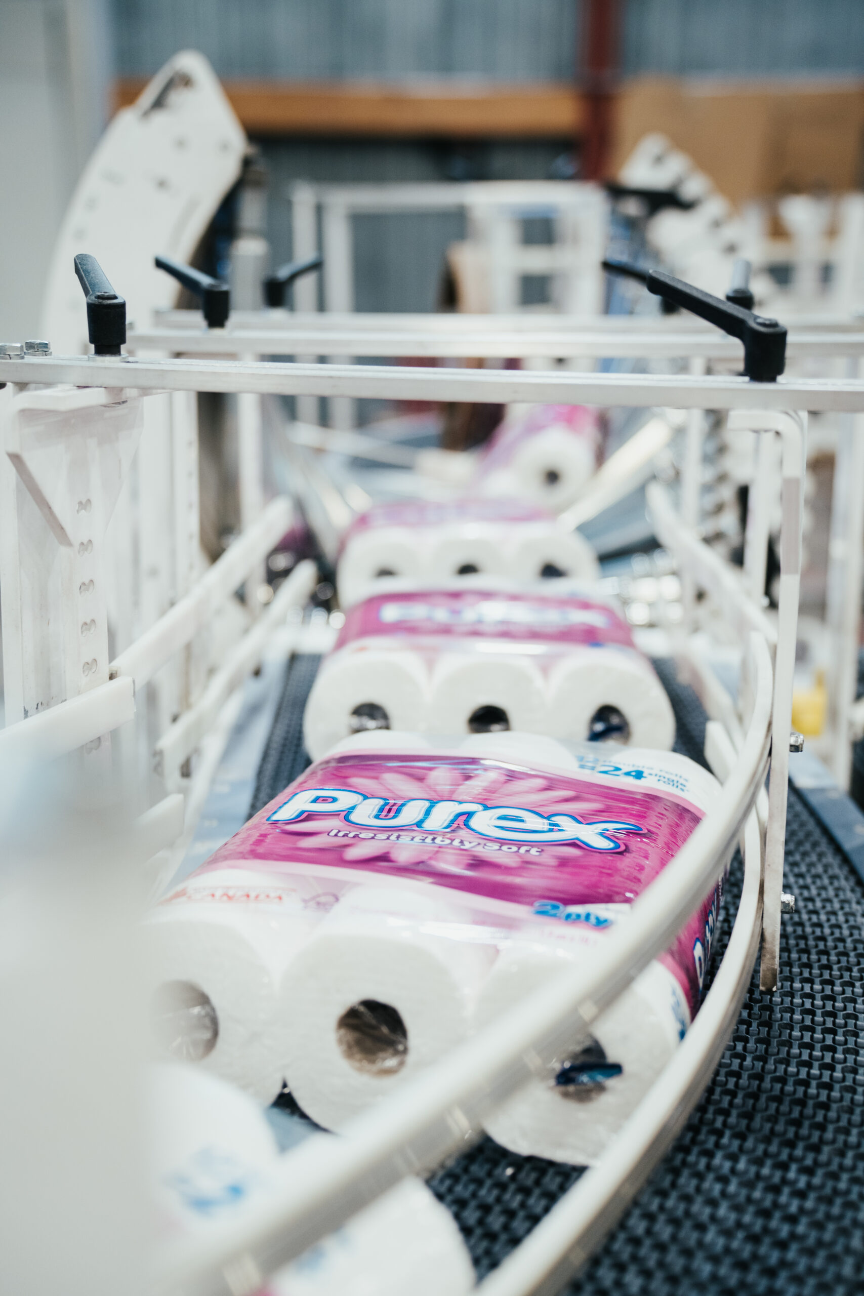 creativebyamy-krugerproducts-employees-7400103 Purex toilet paper on machinery