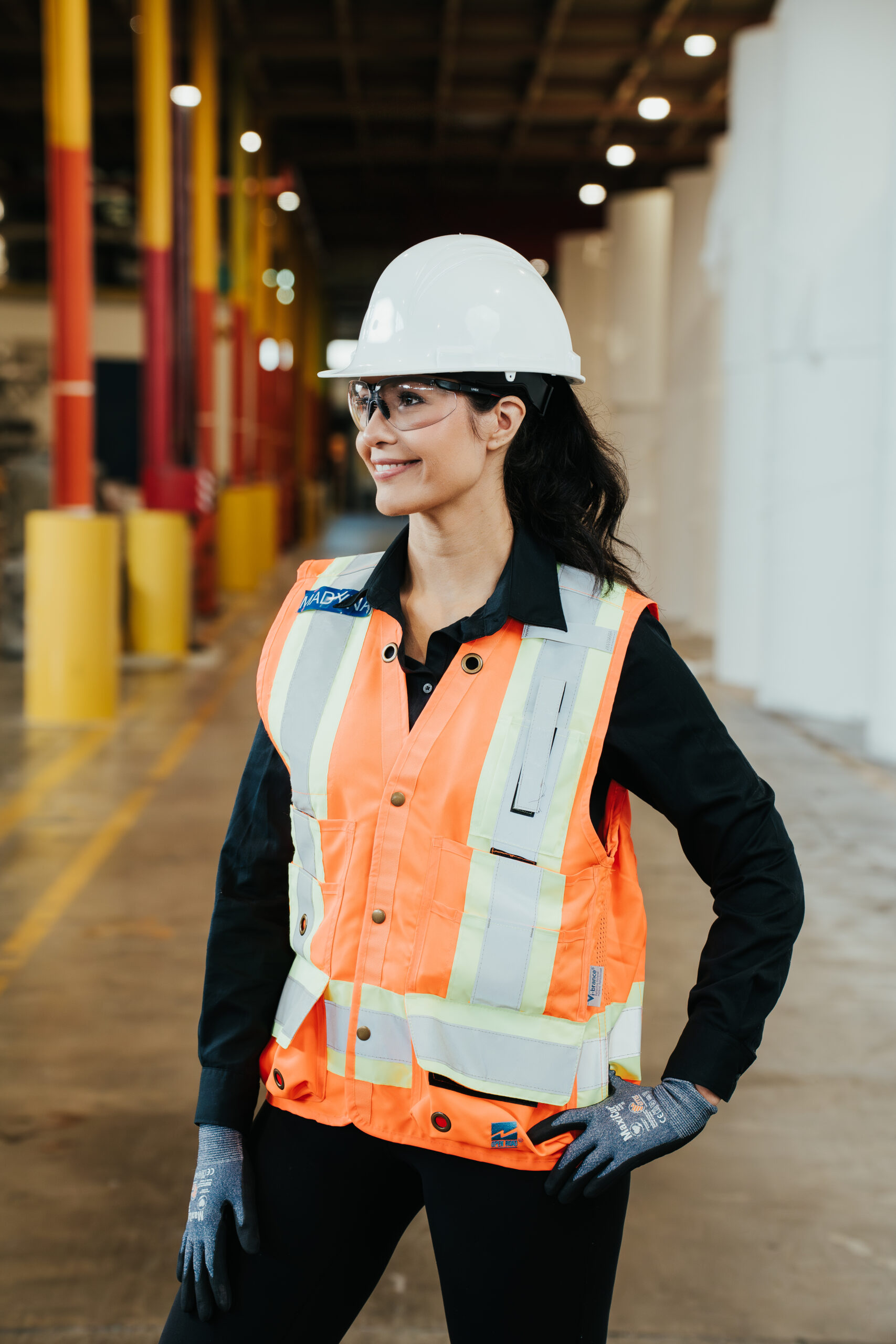 creativebyamy-krugerproducts-portraits-066 Female employee posing in warehouse